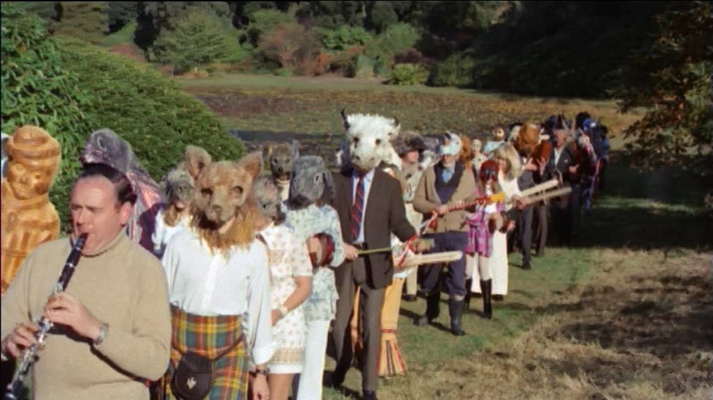 People with animal masks parading